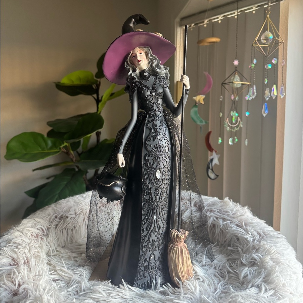 Beautiful Gothic Witch with Broom Stick